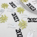 2023 Happy New Year party confetti with glitter gold fireworks and champagne glass shapes - Silver Glitter Double Cups, Gold Firework and Black 2026 Confetti