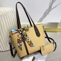 Litchi pattern beige tote bag set with silk scarf and matching purse, chic lifestyle view - Yellow