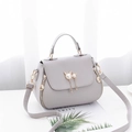 Light grey crossbody bag with lychee texture and cute cat pearl charms for women - Beige Grey