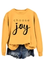 Detail of a bright yellow sweatshirt featuring Choose Joy text and frayed denim shorts - Yellow (Black Font)