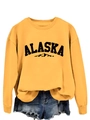 Detail view of yellow Alaska crewneck sweatshirt with mountain graphic and soft fabric texture - S / Yellow (Black Text)