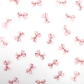 Dettaglio di coriandoli a fiocco rosa acquerello per decorazione tavola romantica - Stile Solo Fiocco