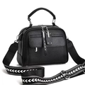 Minimalist black lychee leather crossbody bag with geometric woven strap and silver hardware - 25cmx10cmx19cm / Black