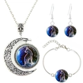 Silver Capricorn zodiac jewelry set featuring moon pendant, earrings and bracelet - Capricorn
