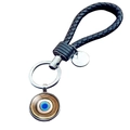 Portachiavi occhio turco blu con cinturino in pelle nera intrecciata e ciondolo - Malocchio con Bordo Dorato Raggiante (JY006342-10)