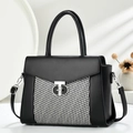 Elegant black and white contrast leather handbag with silver geometric metal clasp - Black