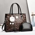 Luxury leopard print handbag set with large tote, small pouch and decorative pompom charm - Coffee