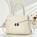 Women's chic beige tote bag with woven texture and silver twist lock detail - White