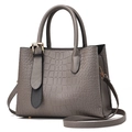 Elegante borsa grigia in pelle sintetica a coccodrillo con manici e tracolla regolabile - Grigio