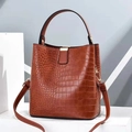 Brown crocodile pattern bucket bag with golden hardware and adjustable strap - Earthy Yellow