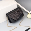 Chic black sequin crossbody bag with gold chain and contrast stitching on gray surface - Default / Sequin Black