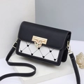 Chic black and white crossbody bag featuring a golden heart lock and floral accents - Black