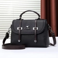 Chic black litchi pattern handbag with dark brown handles and kangaroo metal logo accent - L 23cm W 9cm H 16cm Handle 8cm / Black