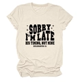 Close-up of Sorry I'm Late His Timing text and stars on beige cotton T-shirt - S / Sand (Black Font)
