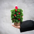 Mini Christmas tree ornament with pine needles, red balls, and a cute Santa hat on top - Mini Christmas Tree With Red Hat (Small)