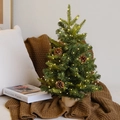 Mini tabletop snowy Christmas tree with warm LED lights, pine cones, and a rustic wood base - 45cm / Green Tree Style