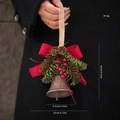 Christmas bell ornament with red burlap bow, pine needles, and pinecone on hemp rope - Type A Coffee