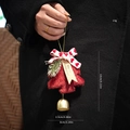 Red plush Christmas tree ornament with heart bow and gold bell hanging on hand - Style G Red Christmas Tree