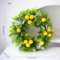 Artificial lemon wreath featuring green leaves and yellow fruit, 40cm outer diameter size - Lemon Wreath / 40CM
