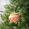 Christmas tree hanging ornament featuring a cupcake design with frosting and sprinkles - Cupcake