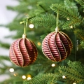 Brown spiral Christmas ball with gold glitter 8cm ornaments on a festive tree - Coffee Spiral Style