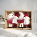 Set di quattro gnomi natalizi in maglia rossa e bianca in una confezione regalo - Stile Quattro Figure Di Babbo Natale
