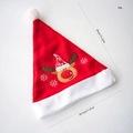 Plush Christmas hat featuring reindeer embroidery and white snowflakes on red fabric - Cartoon Embroidered Reindeer Hat