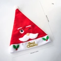 Plush Santa Claus Christmas hat with Merry Christmas text and measurement specs - Winking Santa Hat