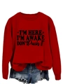 Detail of red crewneck sweatshirt with I'm Here I'm Awake print and raw hem denim shorts - S / Red (Black Font)