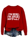Detail of red crewneck sweatshirt with I'm Here I'm Awake slogan in white artistic font - S / Red (White Font)