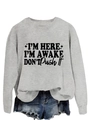 Detailed view of grey sweatshirt with I'm Here I'm Awake printed slogan and cotton texture - Grey (Black Font)