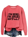 Detailed view of brick red sweatshirt fabric with I'm Here I'm Awake printed text - Red (Black Font)