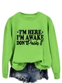 Close-up of text print on neon green sweatshirt with relaxed dropped shoulders - Neon Green (Black Font)