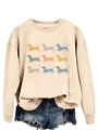 Detail of cream-colored crewneck sweatshirt featuring a colorful 3x3 grid of nine dachshunds - Sand