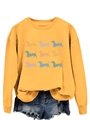 Detail of crewneck sweatshirt in mustard yellow with nine colorful dachshund prints - Yellow