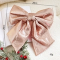 Roségoldene Weihnachts-Glitzerschleife 28x28cm für festliche Baumdekoration - Champagner