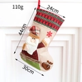 Hanging Christmas stocking featuring a 3D Santa Claus with red and green knit cuff - Santa Claus