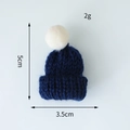 Dunkelblaue Mini-Weihnachtsmütze gestrickt mit weißem Bommel und 5cm Höhenangabe - Blau