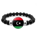Beaded bracelet with black polished beads and Libya flag charm in glass dome - Libya