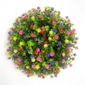 Colorful artificial eucalyptus wreath with pink, purple and yellow flowers on white background - Small Style