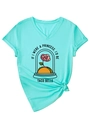 Detail of mint green V-neck T-shirt featuring Taco Belle rose print and stylish waist knot - S / Tops / Deep Water Blue (Black Print)
