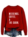 Close-up of Weekends Coffee The Cabin white graphic print on red cotton sweatshirt - S / Red Sweatshirt (White Letters)