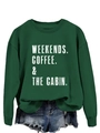 Detail of dark green sweatshirt with white Weekends Coffee and Cabin print and ribbed cuffs - Dark Green Sweatshirt (White Letters)