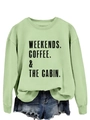 Close-up of mint green sweatshirt with WEEKENDS COFFEE & THE CABIN vintage print - Olive Green (Black Letters)