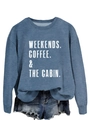 Detail of greyish-blue crewneck sweatshirt featuring white typography and ribbed cuffs - Blue (White Letters)