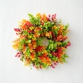 Round artificial wreath featuring vibrant gradient leaves in green, yellow, orange and red - Autumn Gradient Round Leaf Style
