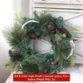 Festive 45cm Christmas wreath featuring bells, white antlers, and natural pine cones - Bell Antler Wreath