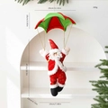 Père Noël en peluche sur parachute rouge et vert avec dimensions de 47cm de hauteur - Grand Père Noël Parachute