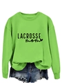Close-up of neon green Lacrosse Mom sweatshirt with heart graphic and denim shorts - Fluorescent Green Sweatshirt (Black Font)