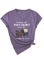 Detail of V-neck heather purple T-shirt with vintage slogan and knotted hem design - Purple